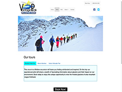 Vantage Peak website tour page with people on Yukon mountains ski tours depicted on hero image 